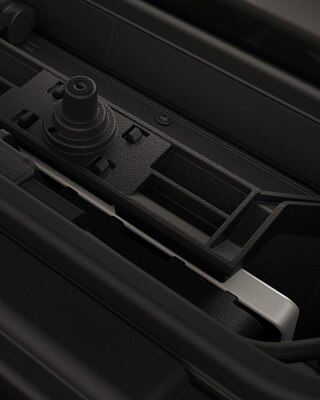 Integrated storage compartment with mobile phone.